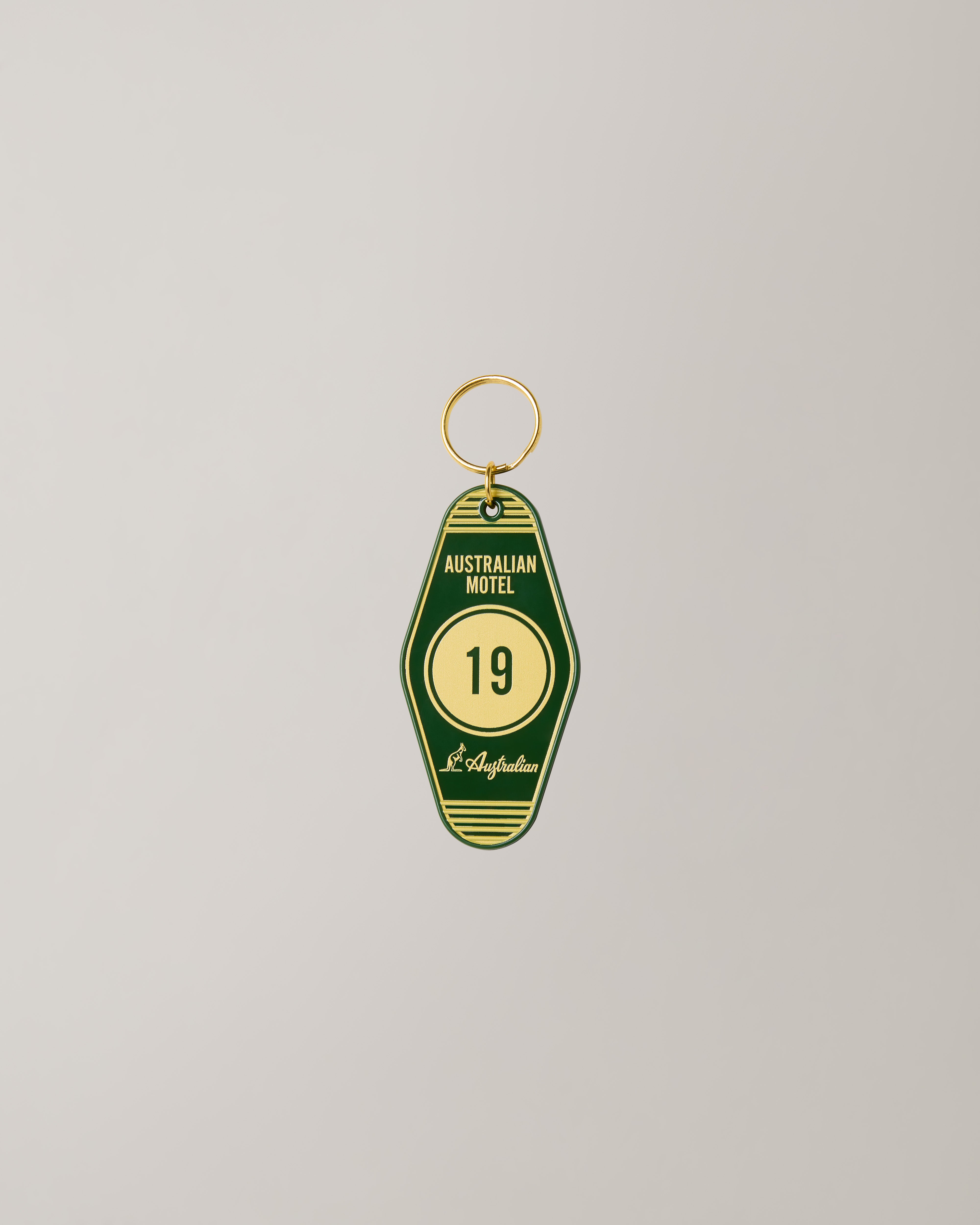 australian-motel-keychain-portachiavi-verde-bottiglia-e-oro image 1