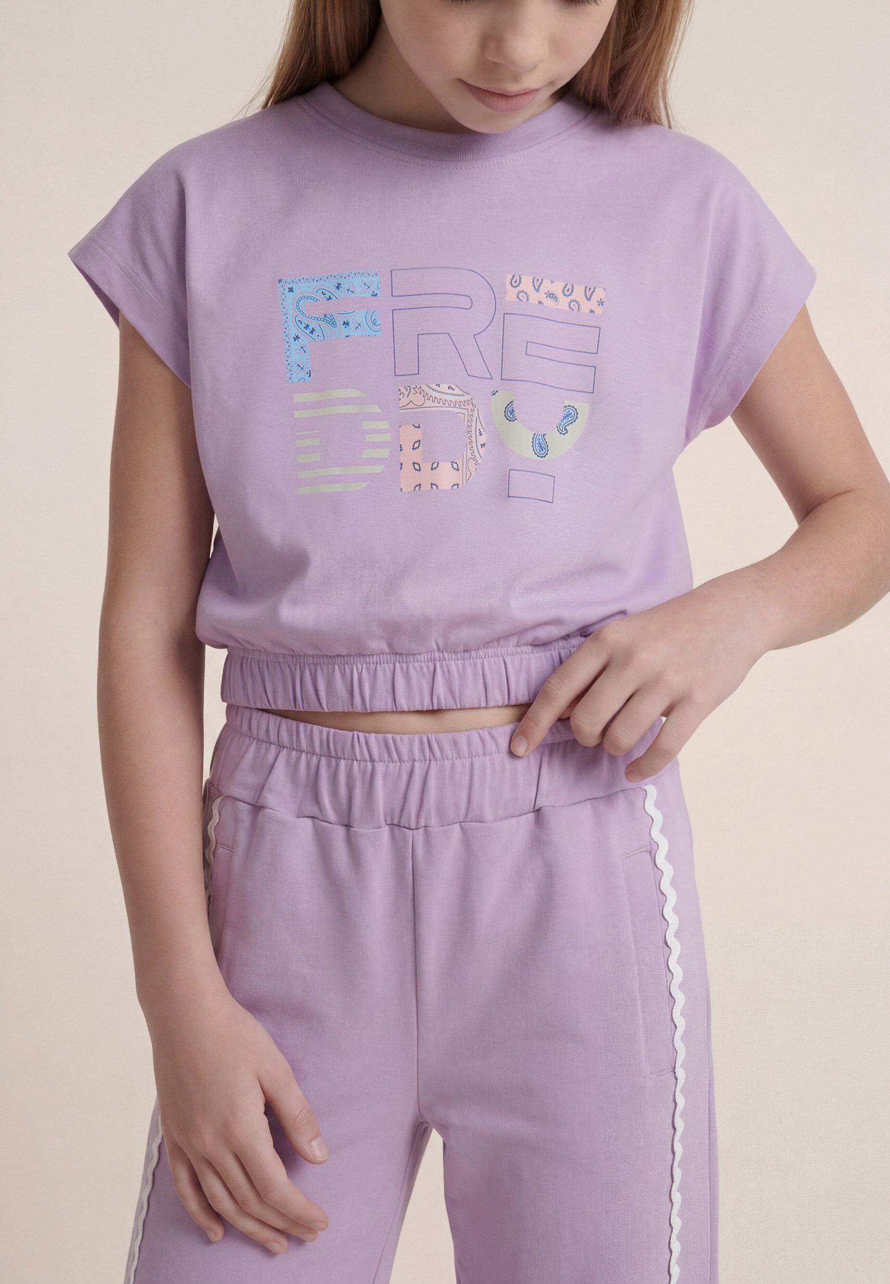 freddy-t-shirt-cropped-bambina-senza-maniche-con-logo-fantasia image 4